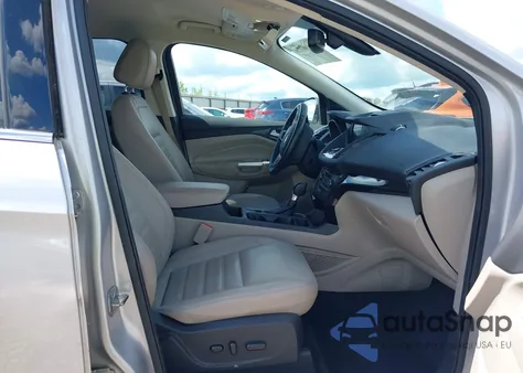 2017 Ford Escape Titanium z USA, uszkodzony, nr VIN 1FMCU9J93HUE43374